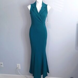 NWT - Small form fitting dress. V-neck sleeveless mermaid dress. Formal dress